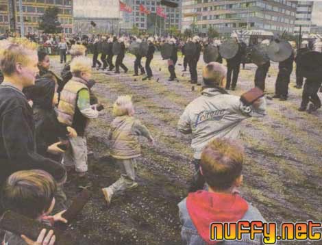 kids attacking police with bricks