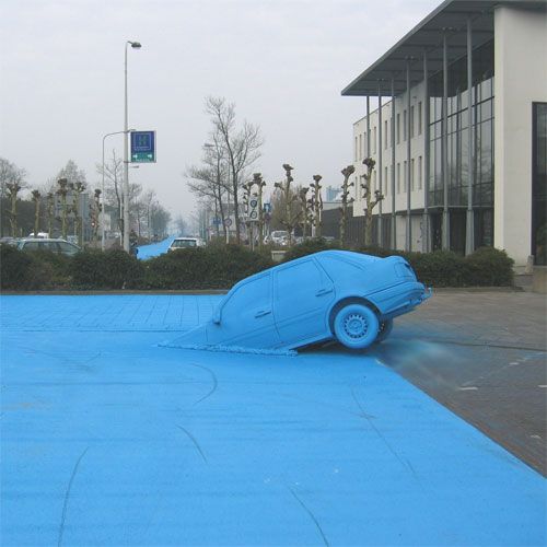 Painting road in blue - street art