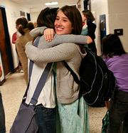 school girls hug